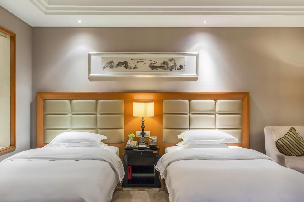 Wyndham Xinyang Downtown Hotel Exterior photo
