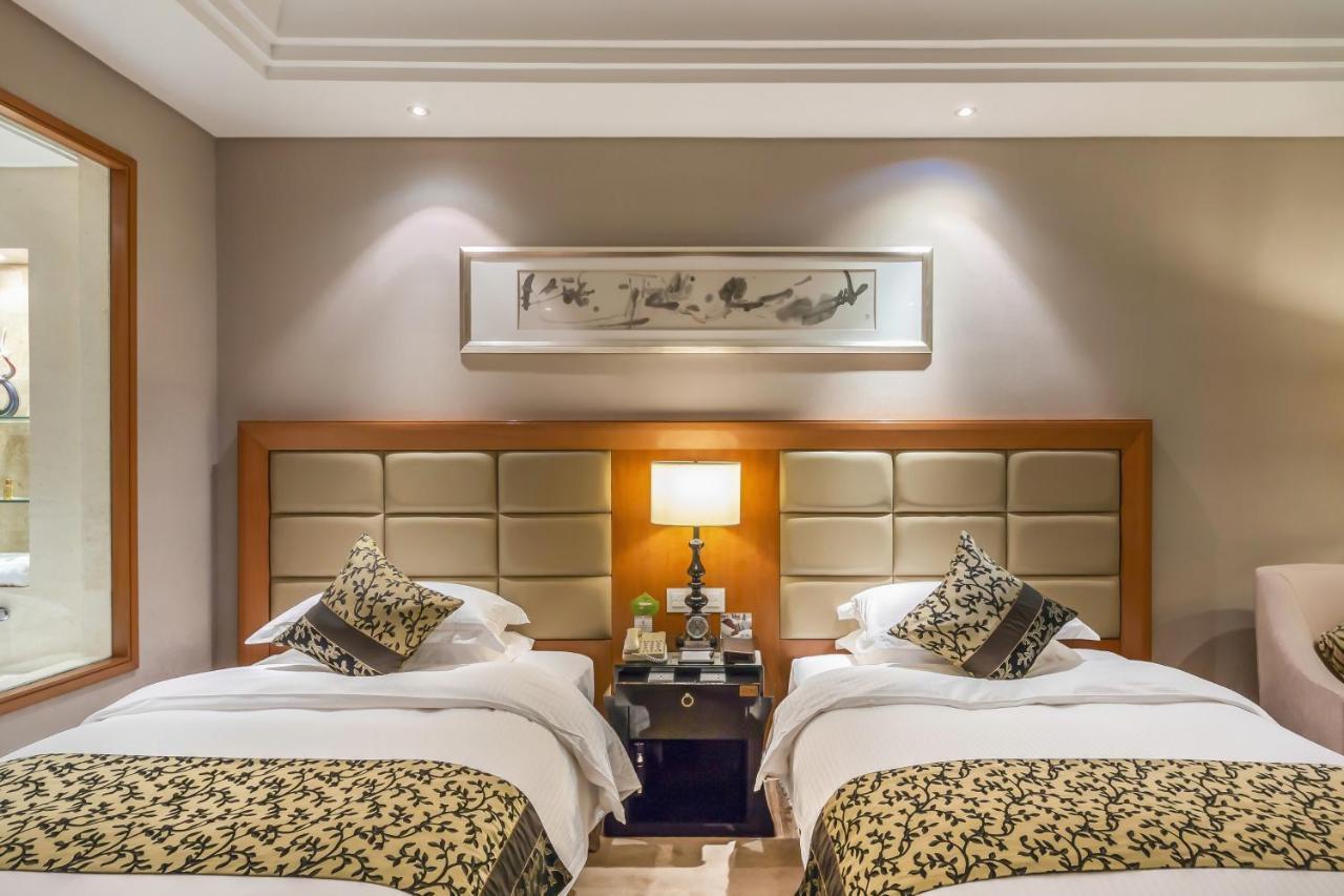 Wyndham Xinyang Downtown Hotel Exterior photo