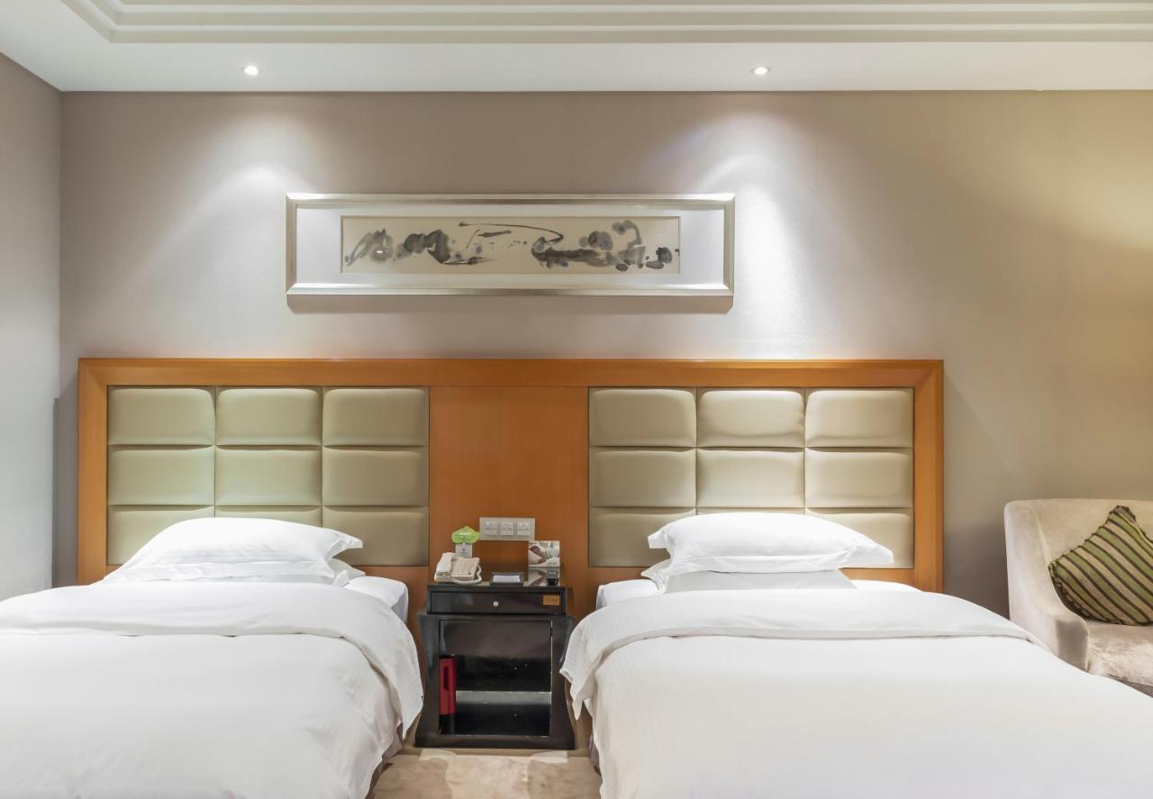 Wyndham Xinyang Downtown Hotel Exterior photo