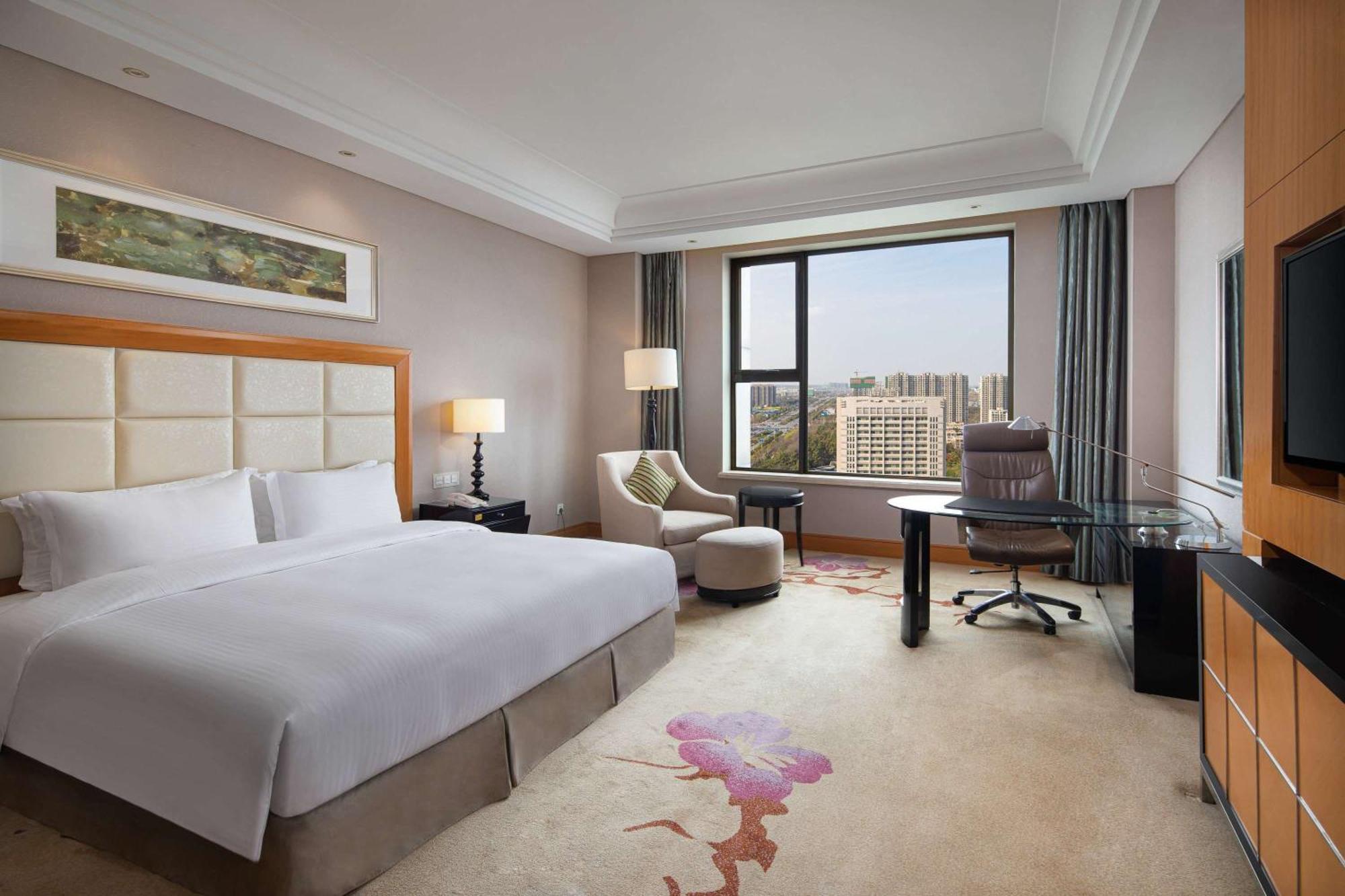 Wyndham Xinyang Downtown Hotel Exterior photo
